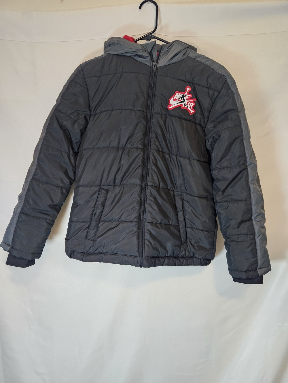 Jordan Black Puffer Jacket with Gray Panels and Red Logo